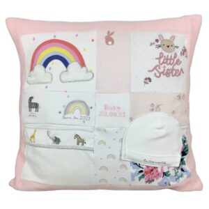 Cushion keepsake created from girly baby clothes bordered and backed in Blush pink fleece