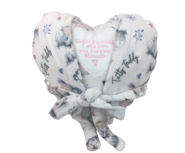 Heart shaped cushion keepsake made from loved ones dressing gown. Personalized with message