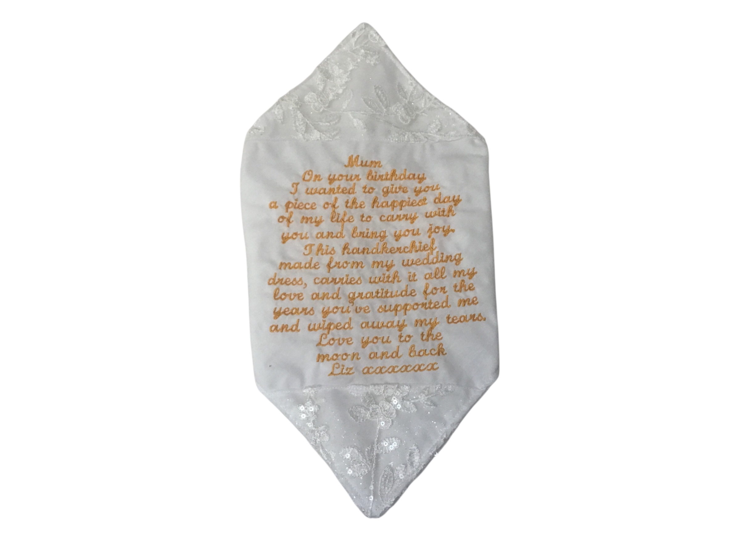 A handkerchief made from a wedding dress with golden coloured personalised embroidery